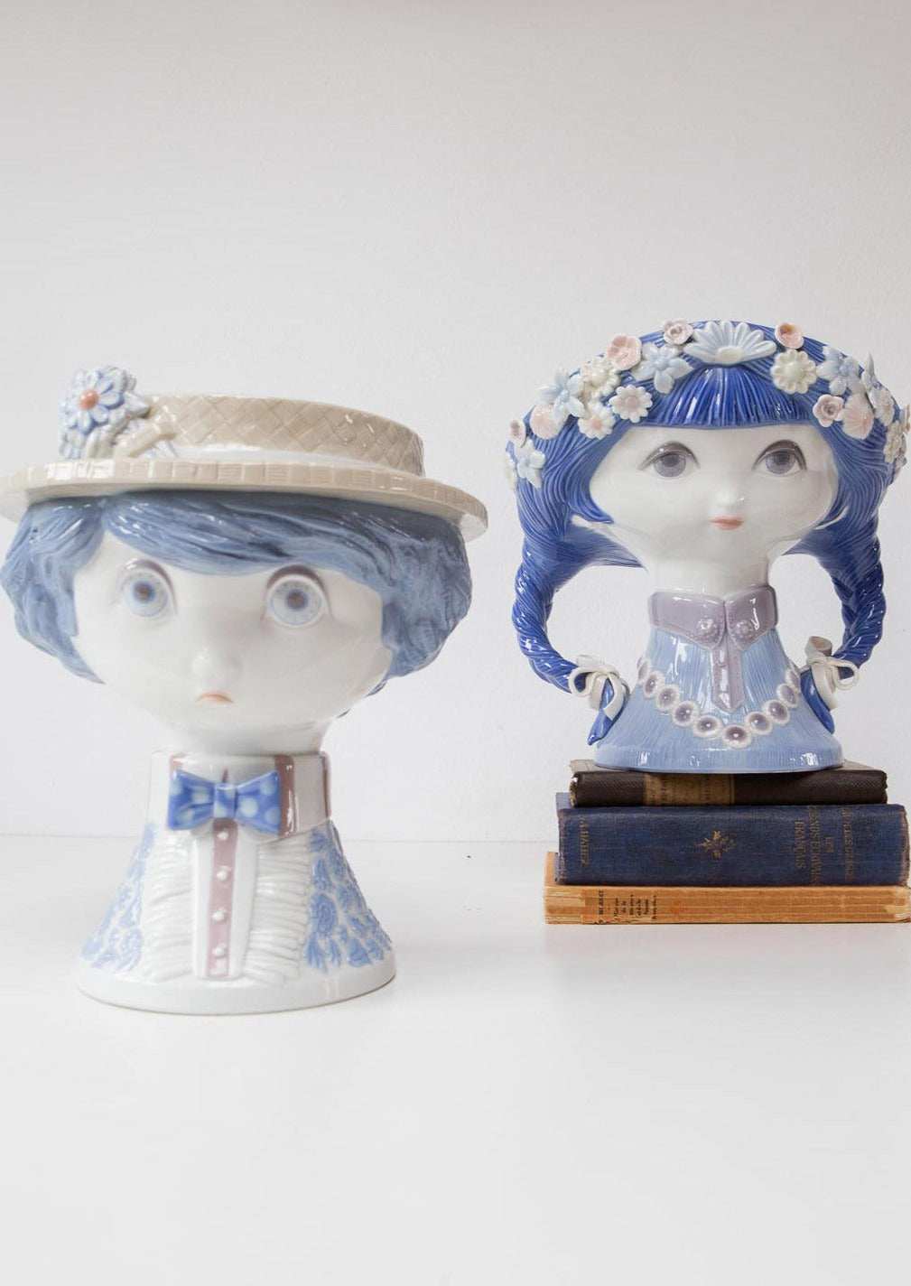 pareja esculturas lladró porcelana niño con sombrero de paja niña con trenzas maceteros