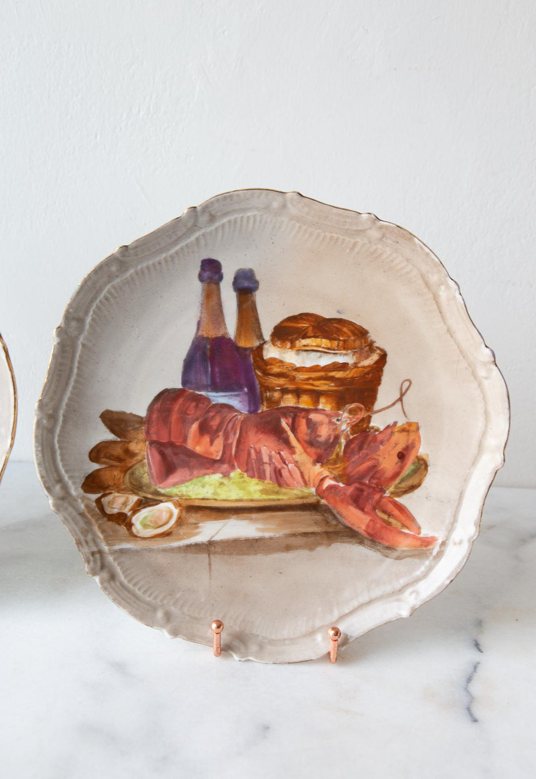 Pareja platos decorativos bodegones porcelana. Francia s. XX