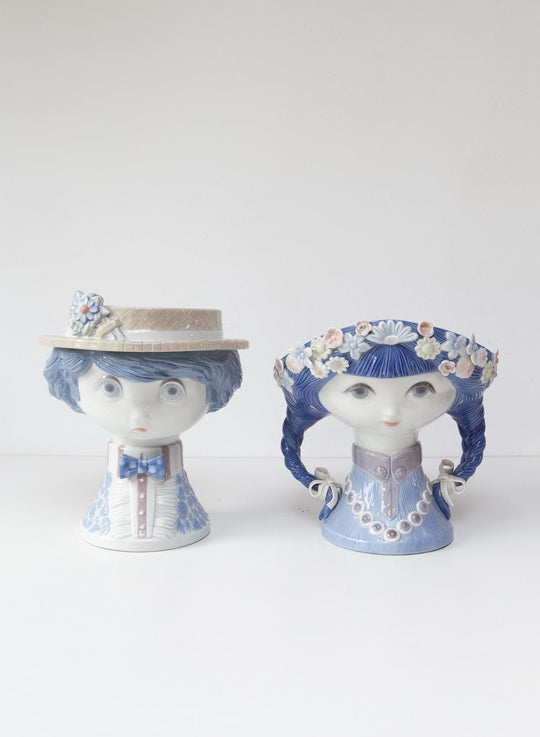 pareja esculturas lladró porcelana niño con sombrero de paja niña con trenzas maceteros 