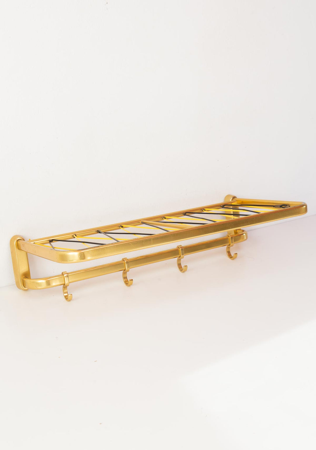 perchero de pared metal dorado vintage