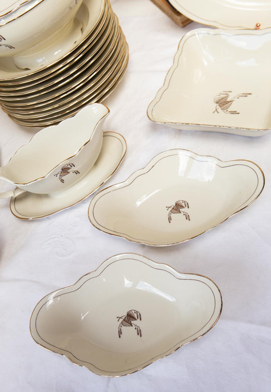 vajilla porcelana sueca hackefors crema y dorado