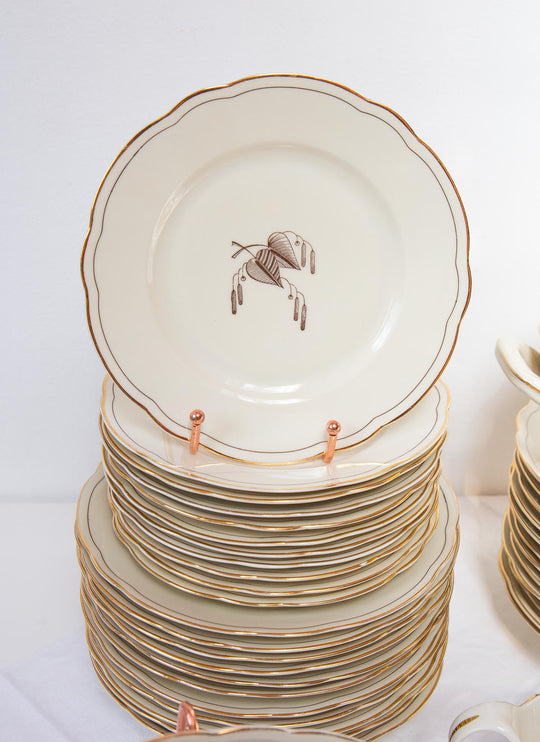 vajilla porcelana sueca hackefors crema y dorado