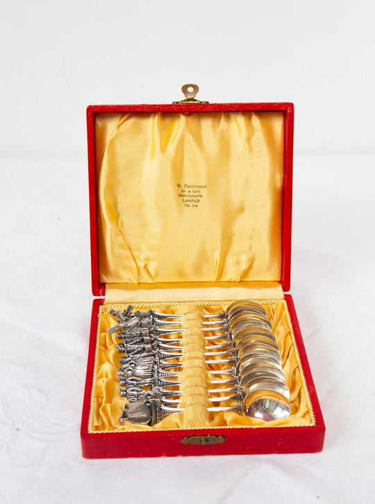 Juego 12 antiguas cucharillas de plata suecas con personajes y molinos c. 1920/30