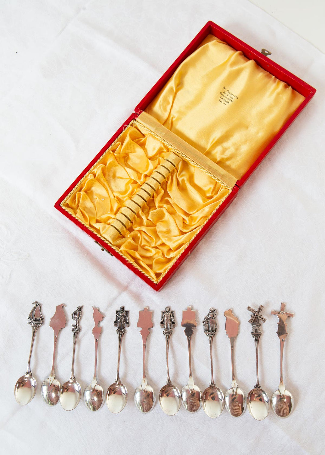Juego 12 antiguas cucharillas de plata suecas con personajes y molinos c. 1920/30