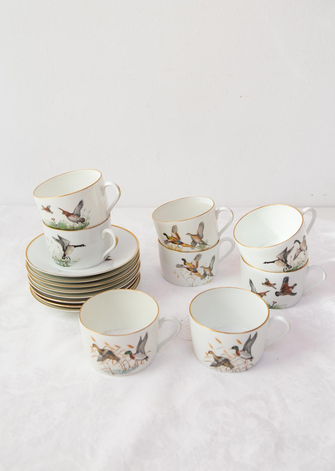 Juego de taza de té y platillo Porcelaine de Paris "pájaros" (1/6)