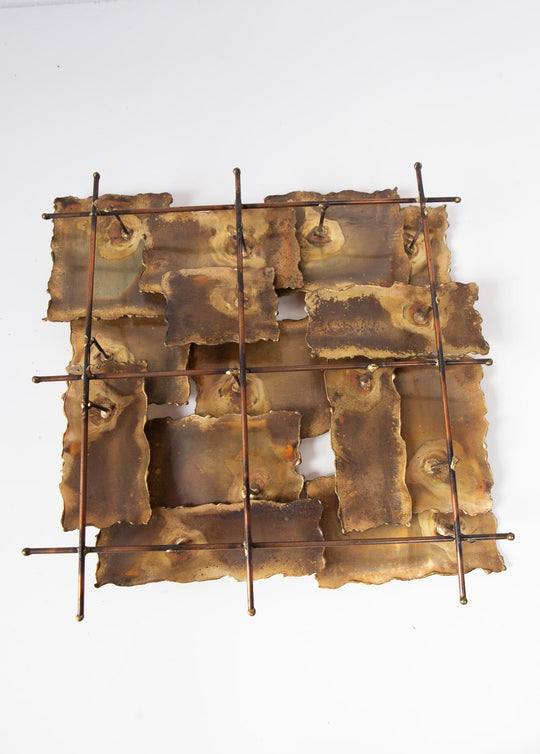 Escultura o aplique láminas latón USA c. 1970s (28 cm)