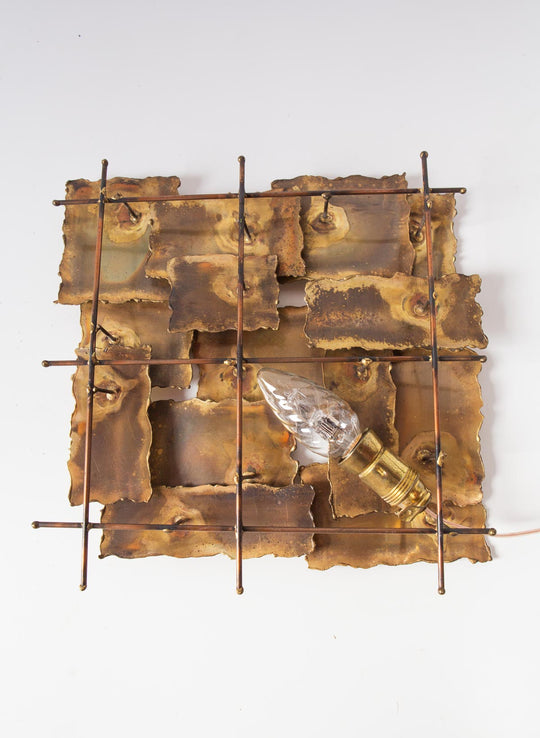 Escultura o aplique láminas latón USA c. 1970s (28 cm)