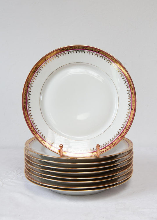 Juego de 9 platos LLANOS porcelana Limoges filo dorado y granate