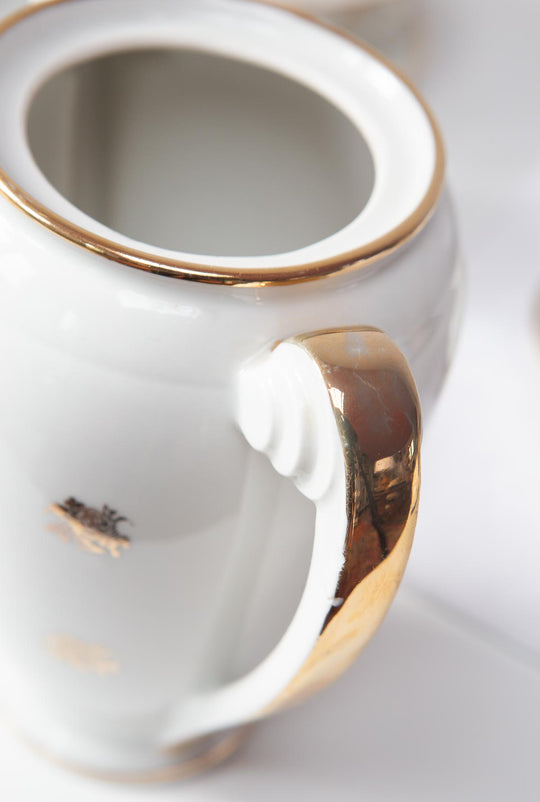Juego de café porcelana Limoges PL florecillas doradas (34 PIEZAS)